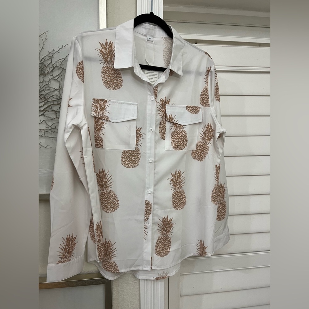 White Shirt with Pineapple Print Very Light Weight. NWT. XL. Pit to pit is 22”.